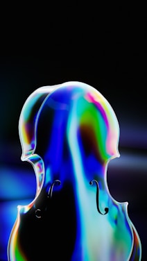 A stylized and colorful portrayal of a violin or cello, featuring a vibrant blend of blue, green, and pink hues that create a mesmerizing gradient across its surface. The background is dark, emphasizing the iridescent sheen of the instrument.