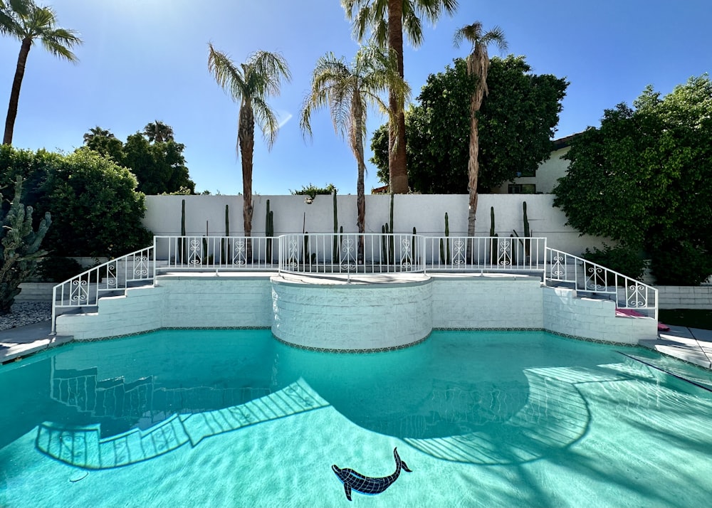 a swimming pool with steps leading up to it