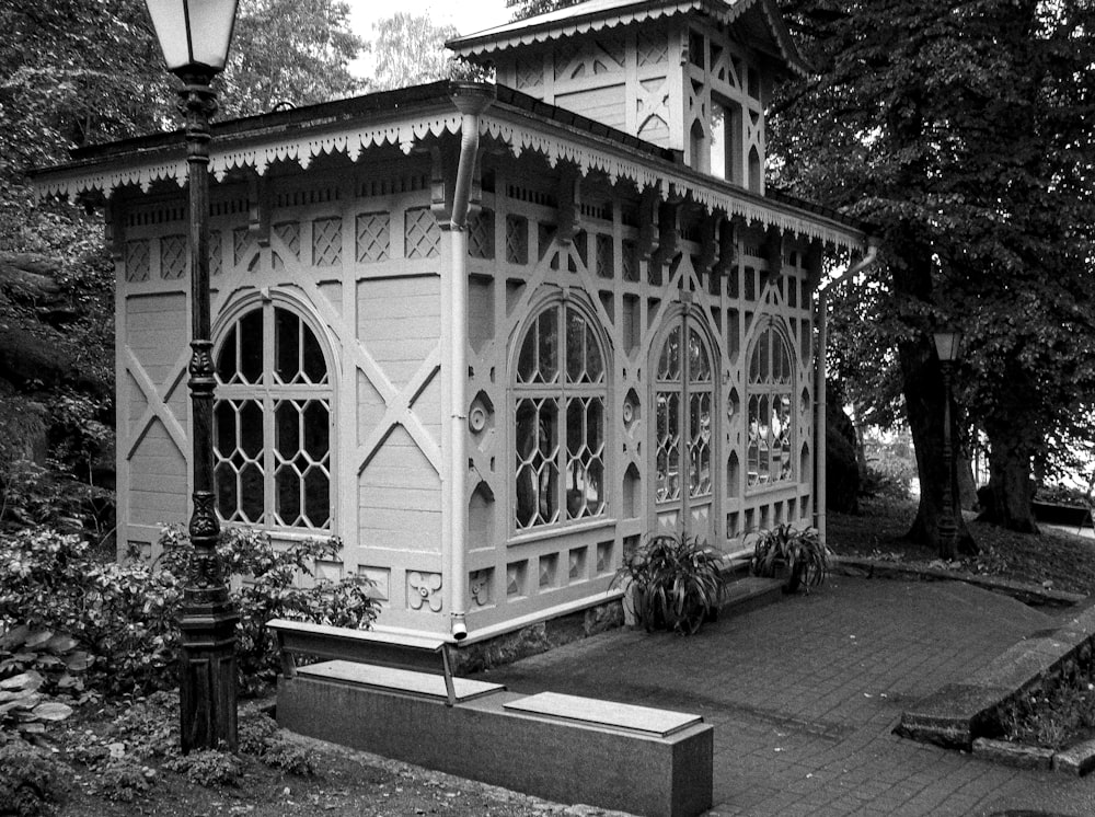 a black and white photo of a gazebo