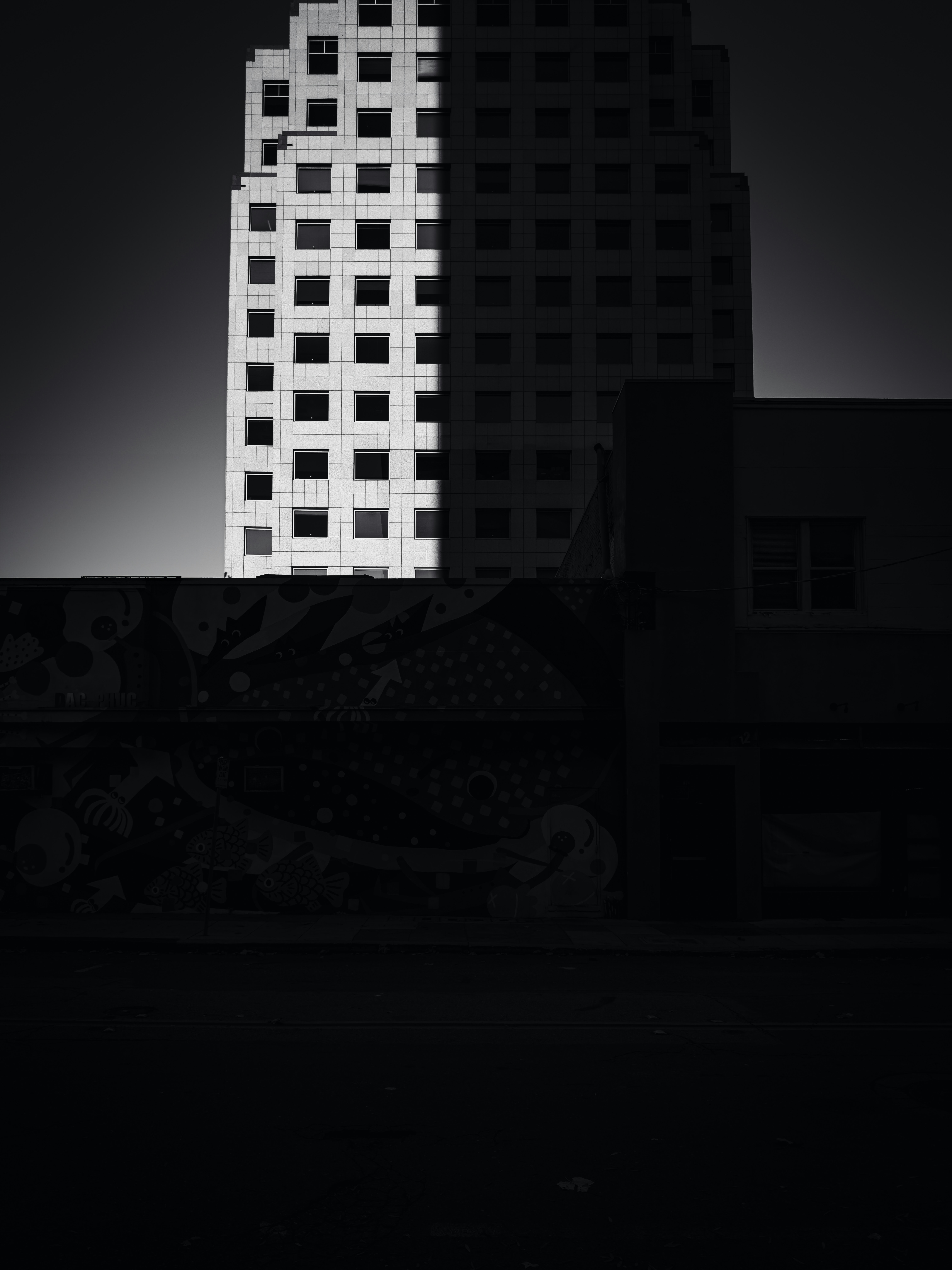 a black and white photo of a tall building