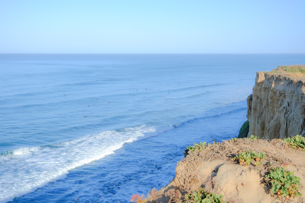 a view of the ocean from a cliff