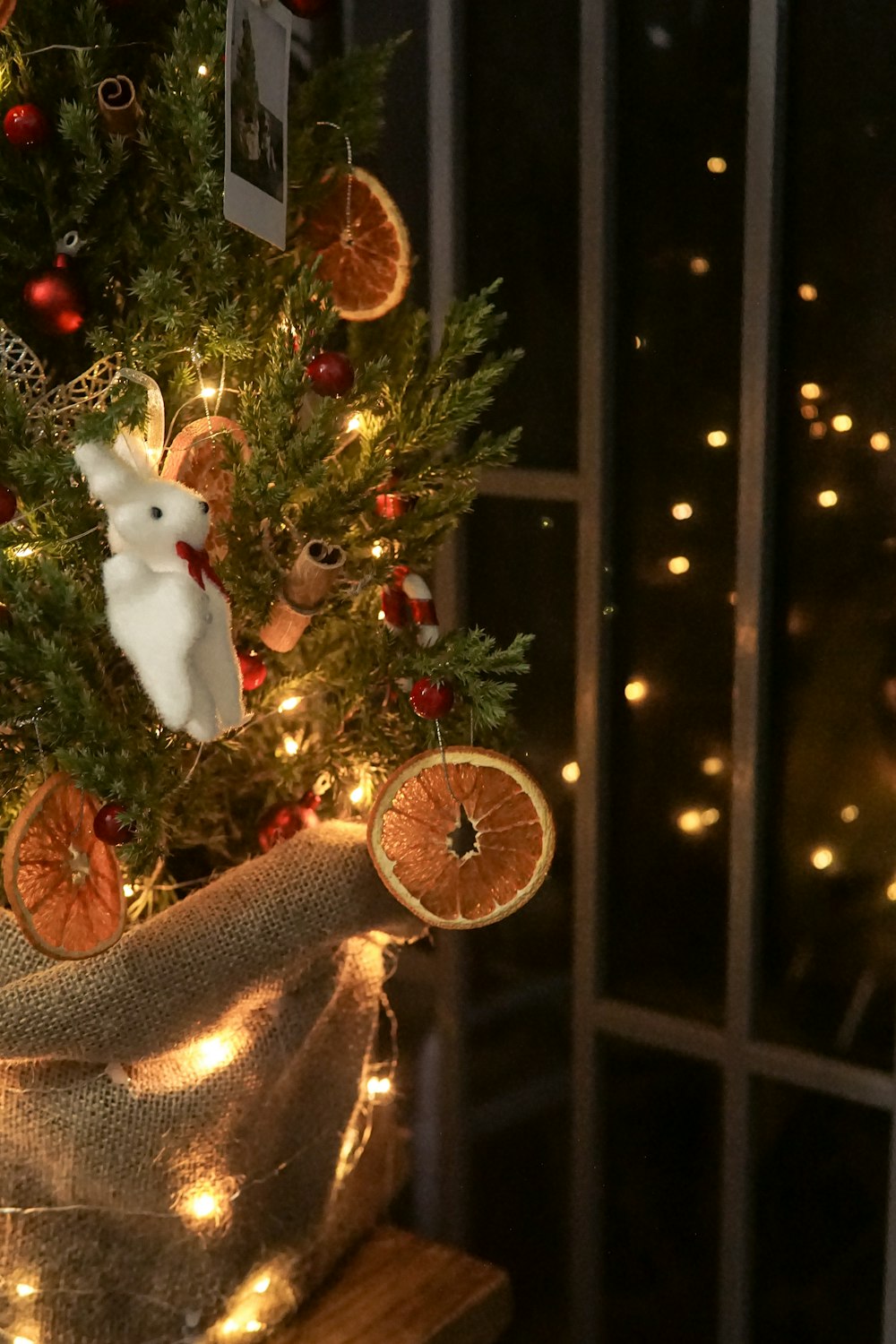 a christmas tree decorated with ornaments and lights