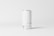 A plain white aluminum can is placed against a minimalistic, light gray background. The can has a sleek and smooth surface with text indicating a capacity of 200ml, and includes a small QR code and website information near the bottom.