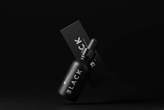 A sleek black box with the Goblin Pillow logo, surrounded by neatly packaged medication on a dark background.