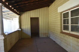 Commercial porch installation in progress with a team working efficiently.