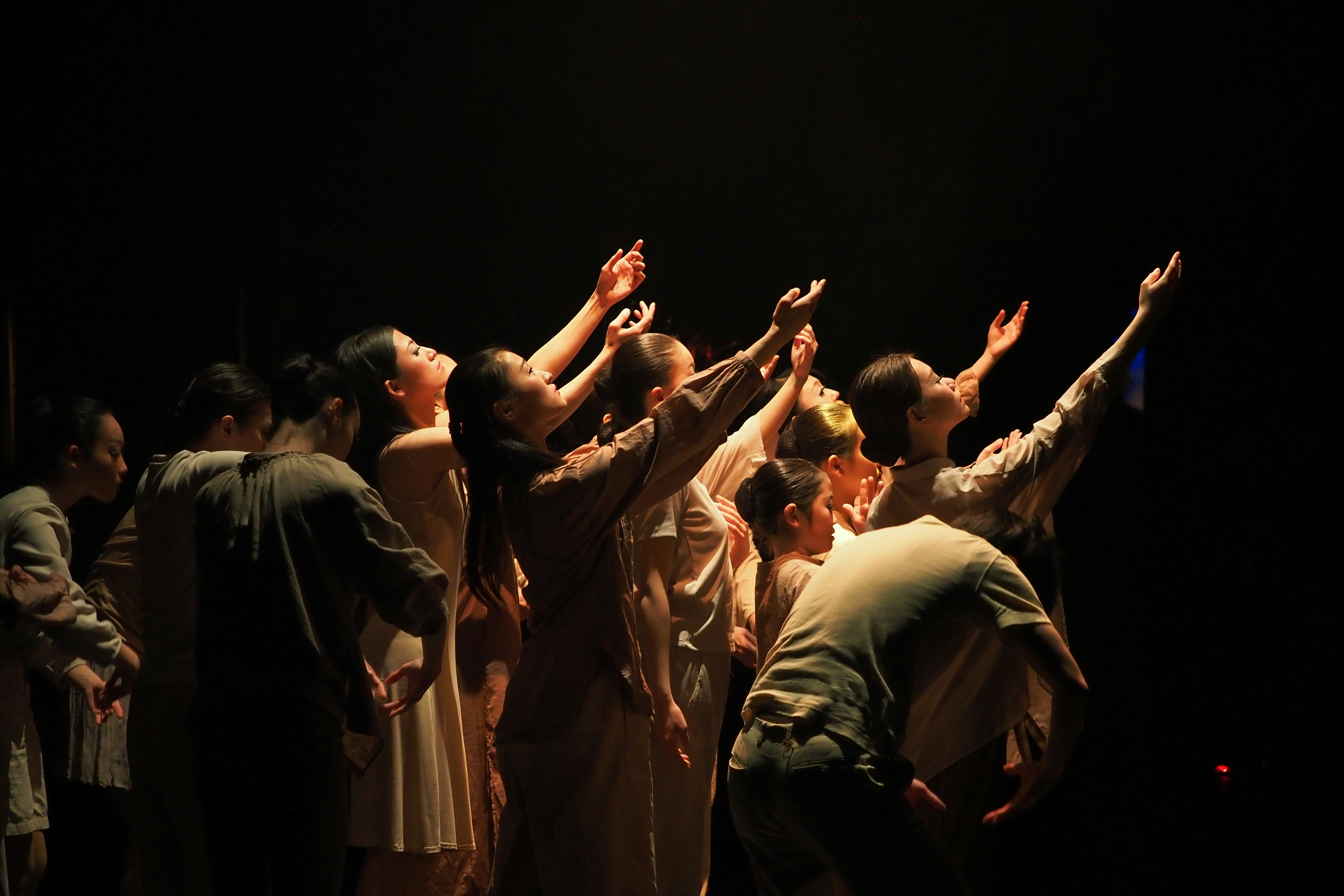 a group of people standing on top of a stage