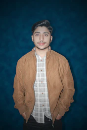 A calm, professional portrait of Jason, the trusted face behind Blue Line Connection, set against a deep blue background.