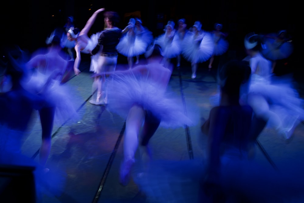 a blurry photo of a group of dancers