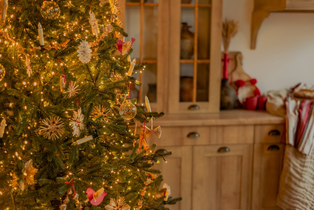 a decorated christmas tree in a living room