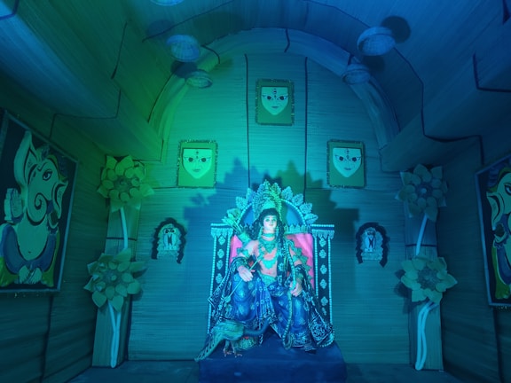 A cozy lounge space with warm colors and tasteful artwork reflecting Vrindavan's spirit