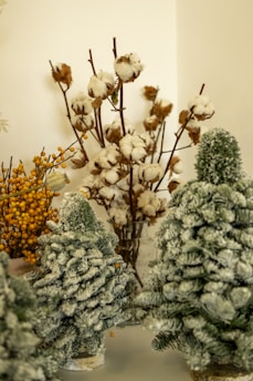 a close up of a group of fake trees