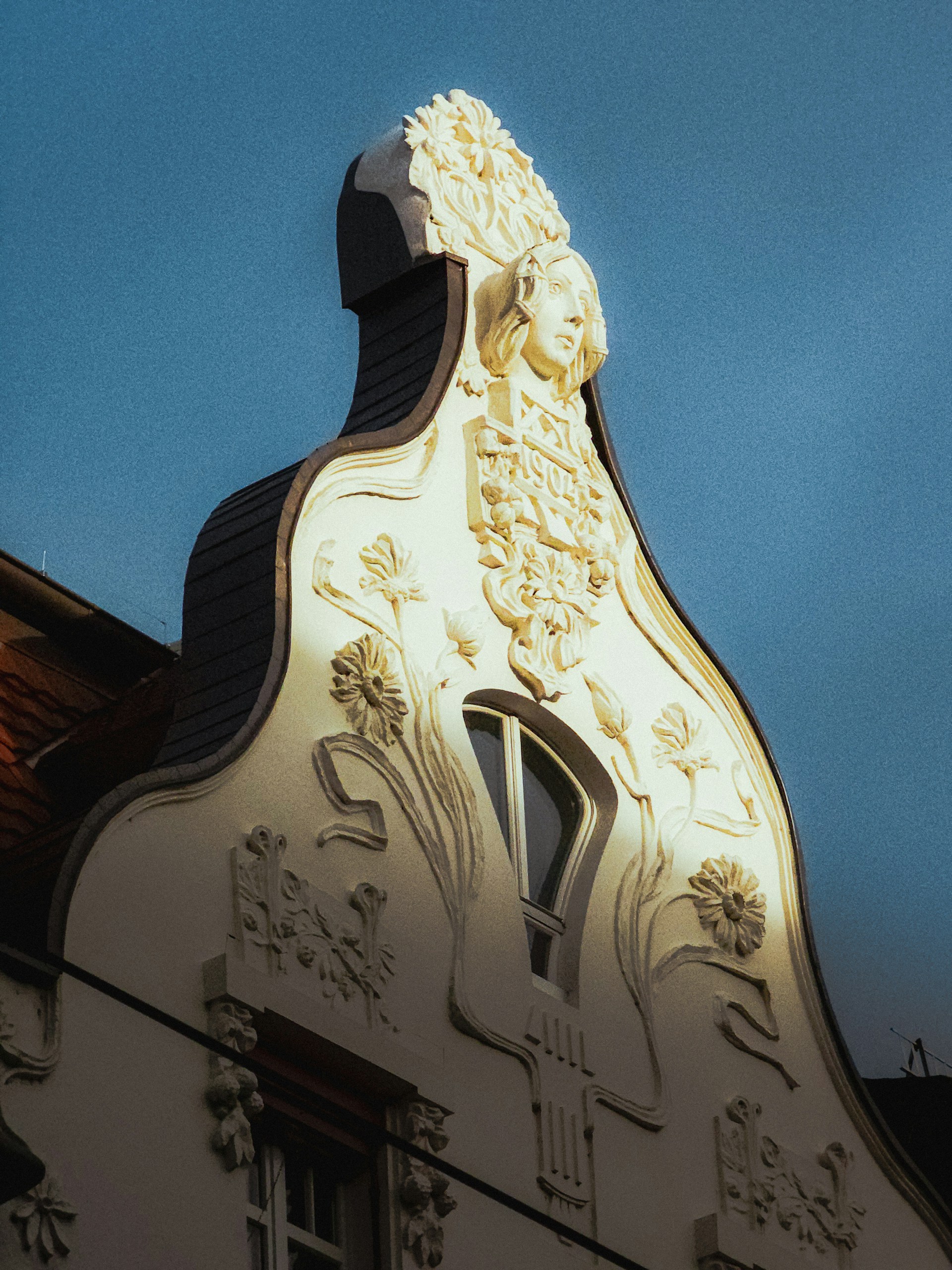 woman wearing yellow long-sleeved dress under white clouds and blue sky during daytime