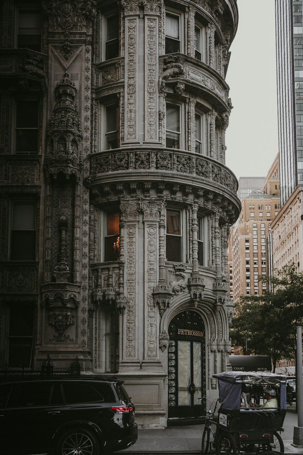 a tall building with a bicycle parked in front of it