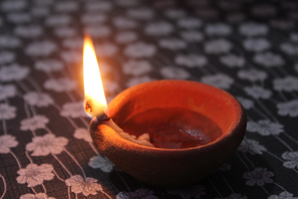 a small wooden bowl sitting on top of a table