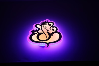 A radiant figure surrounded by light, representing intuition and manifestation.