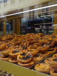 a display case filled with lots of pastries