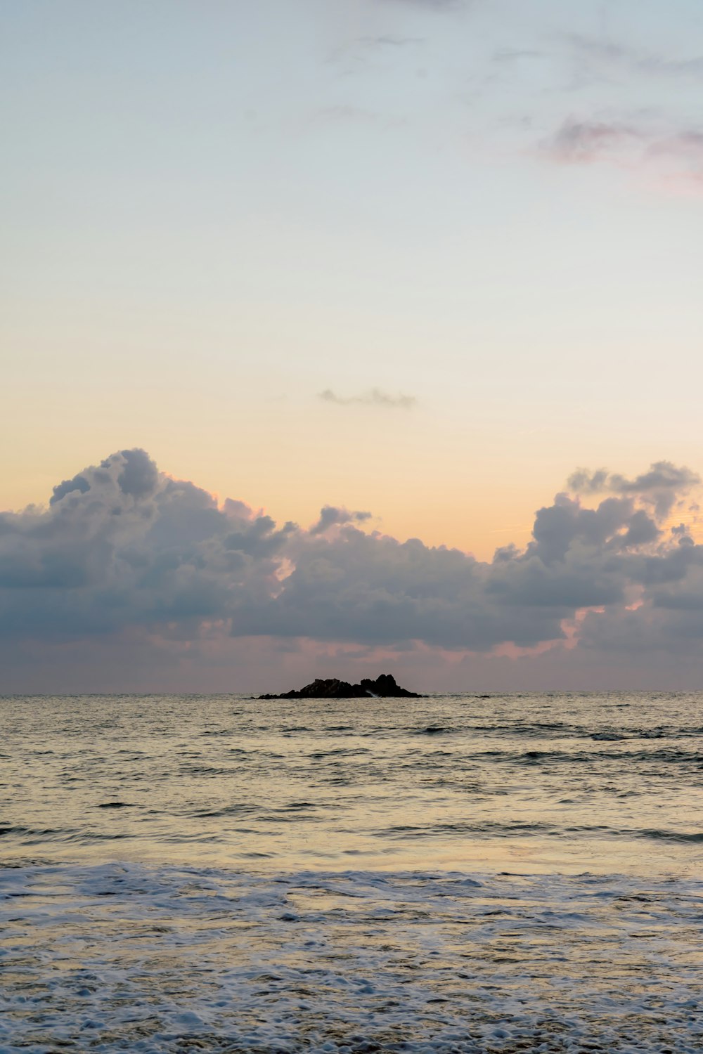 a small island in the middle of the ocean