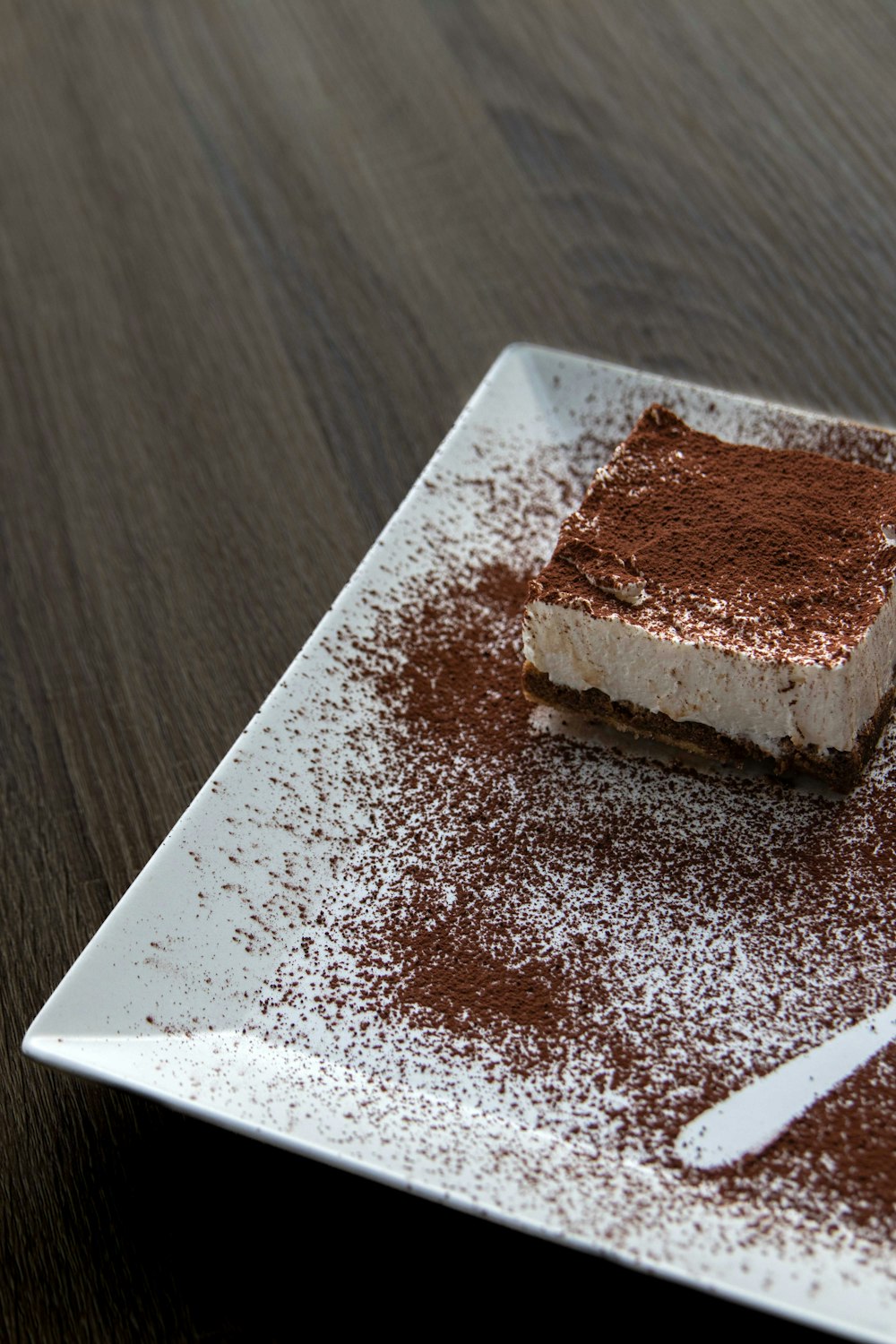 a plate with a piece of cake on it