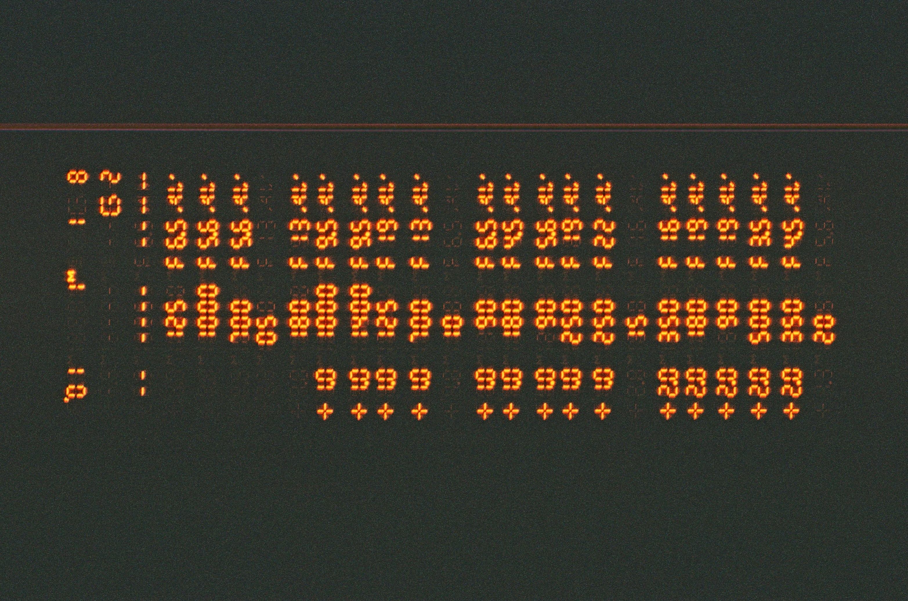 a close up of a sign with a lot of dots on it