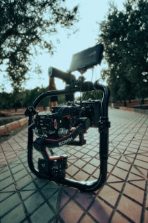 a camera sitting on top of a tripod