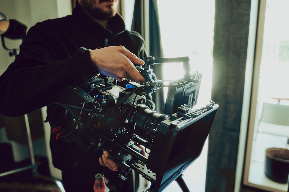 a man standing in front of a camera