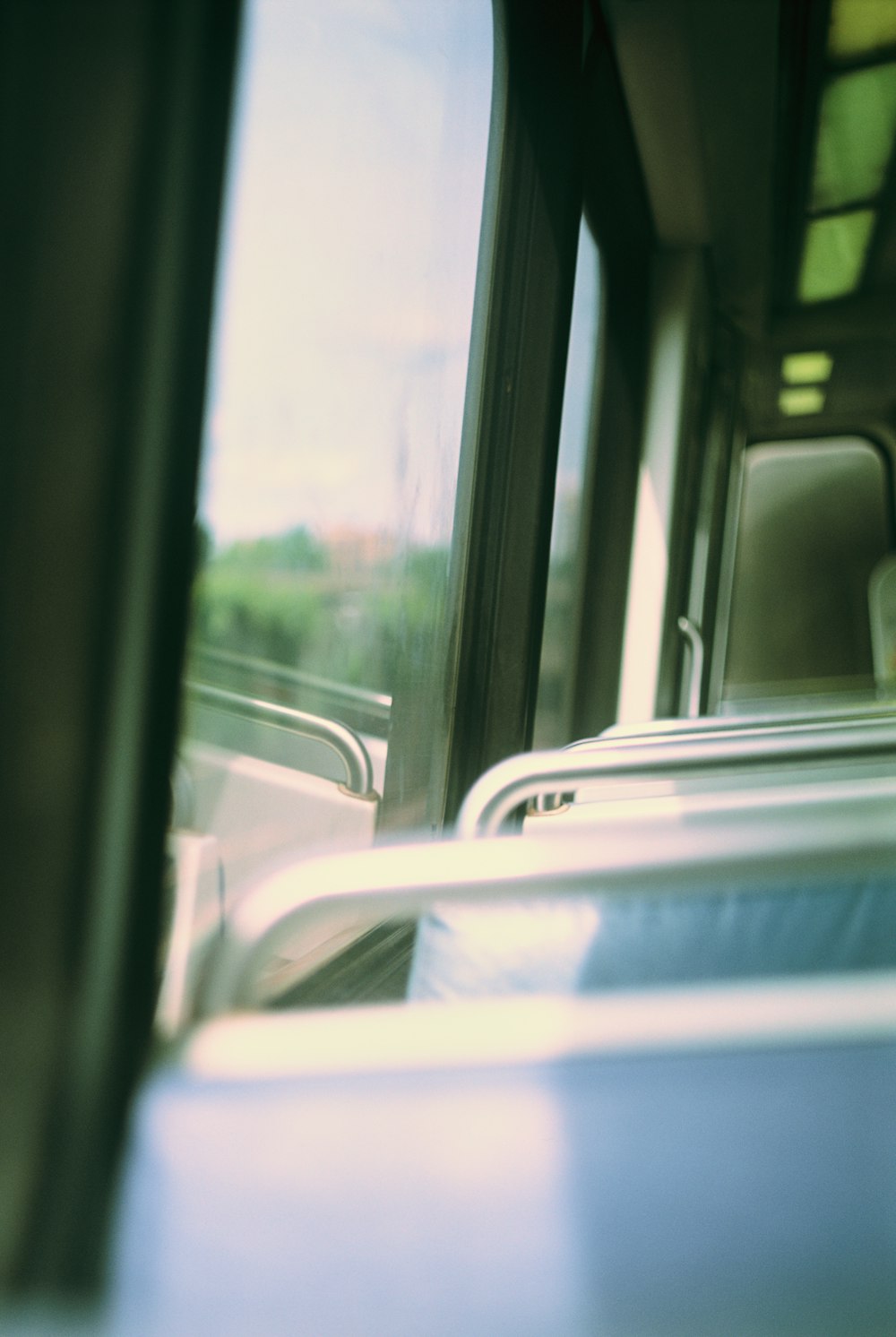 a view from inside a bus looking out the window