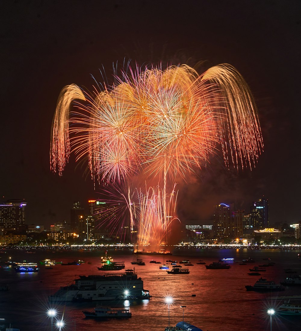 a large fireworks display over a body of water