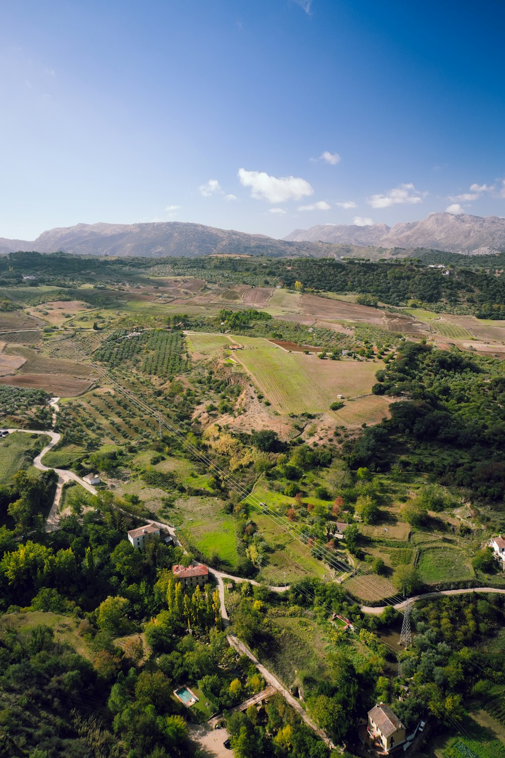 an aerial view of a lush green countryside