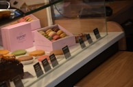 A side-by-side view of the maccart category filter sidebar with checkboxes for brands and price ranges on a white background.