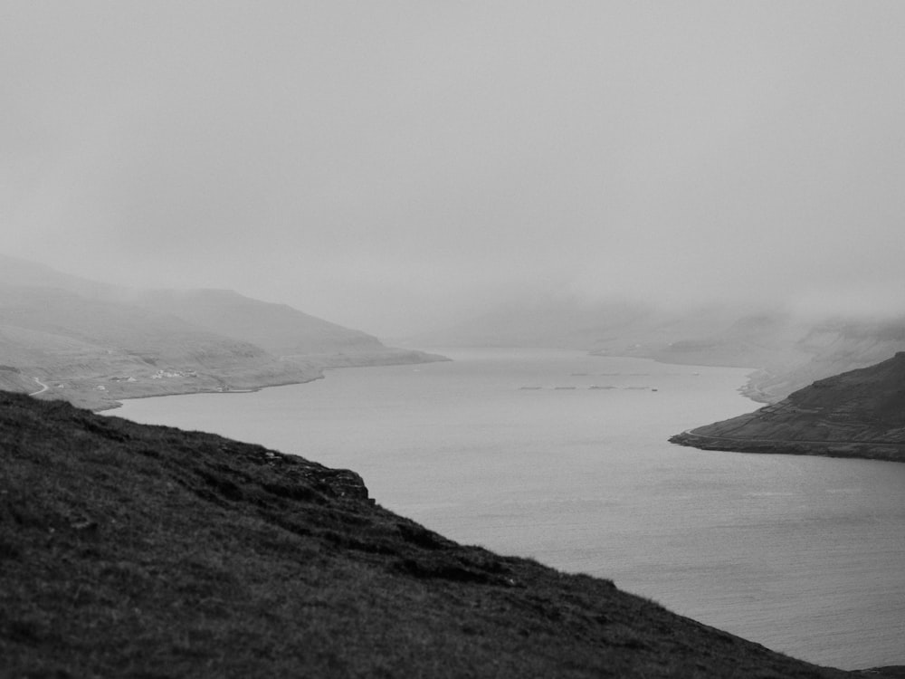 a black and white photo of a body of water