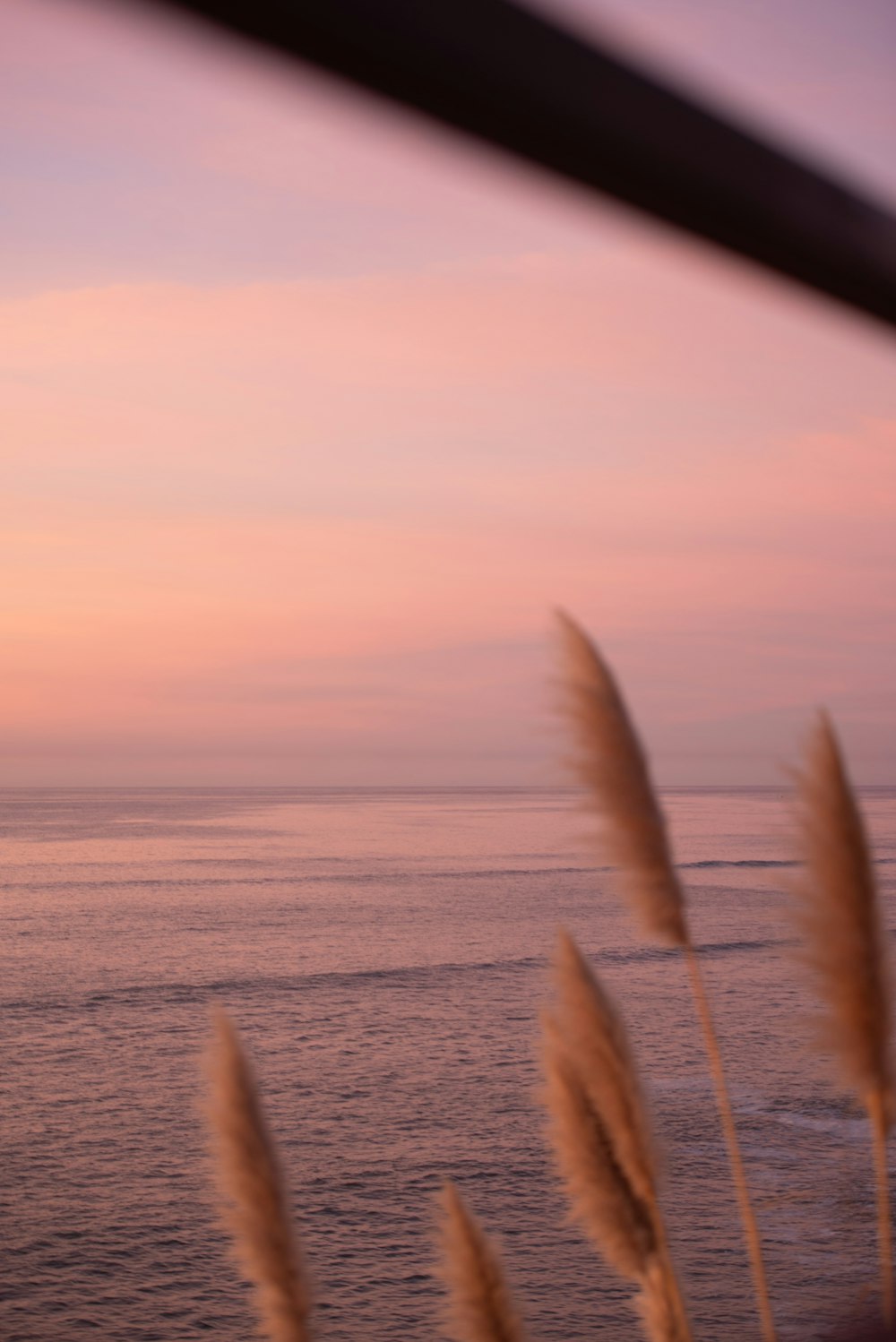 a view of a body of water at sunset