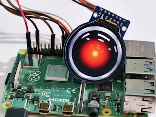 a close up of an electronic device with a red light