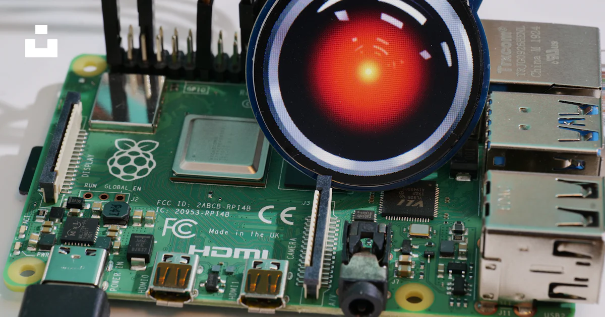 Arrow Electronics Raspberry Pi A close up of an electronic device with a red light photo – Free ...