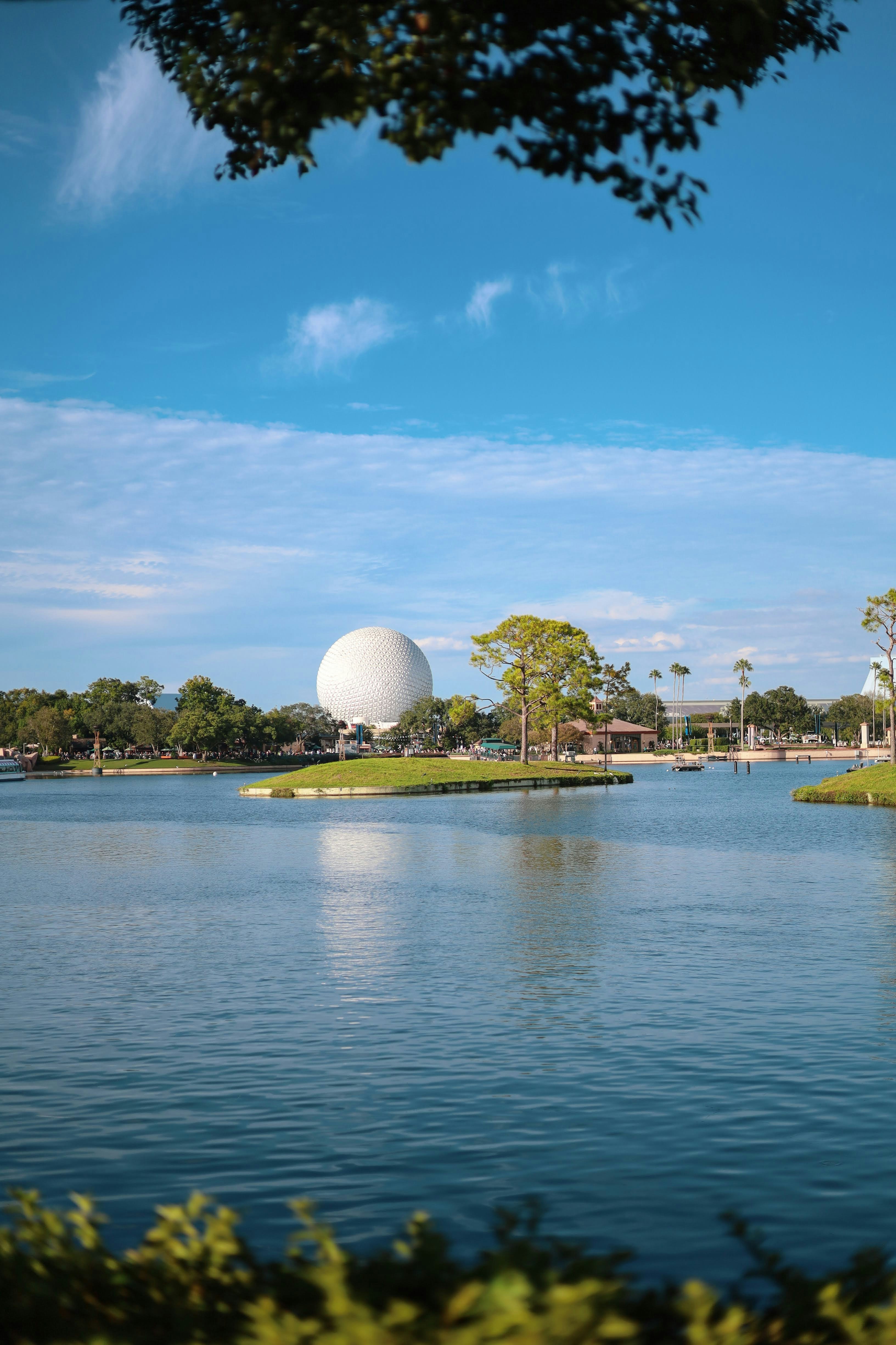 a large white ball sitting on top of a lake