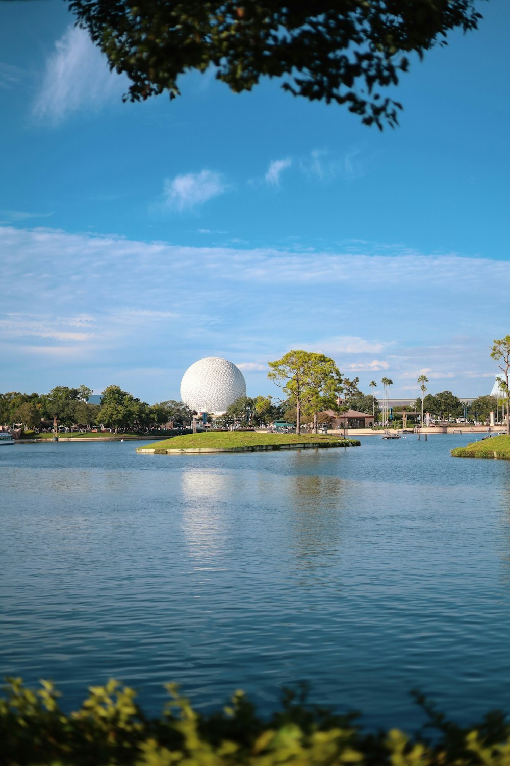 a large white ball sitting on top of a lake