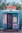 A modern photo booth with colorful props at a lively corporate event.