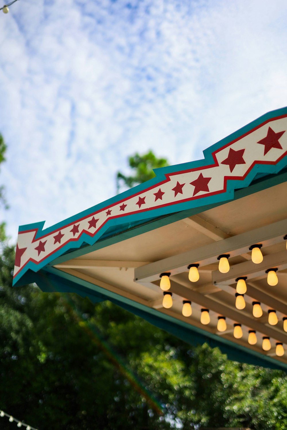 a close up of a lit up merry go round