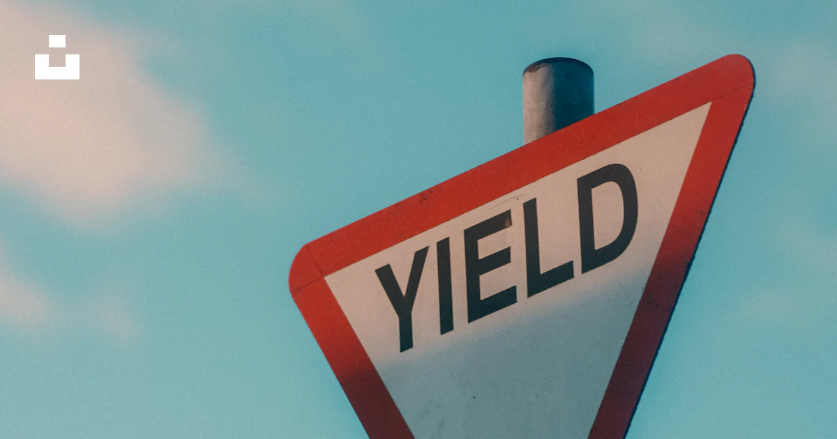 Microsoft Inbox Yield Sign A yield sign with a sky background photo – Free Sign Image on Unsplash