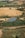 A scenic landscape featuring expansive fields with neatly arranged crops. A small lake is surrounded by dense evergreen forests. The background consists of more cultivated fields and scattered trees, indicating agricultural activity in the area.