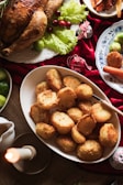 A festive Christmas lunch table set with delicious dishes.