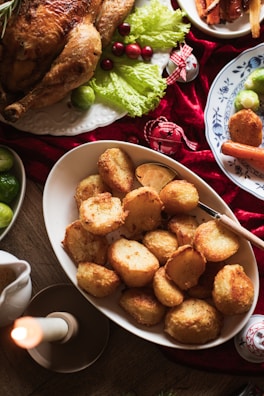 A festive Christmas lunch table set with delicious dishes.