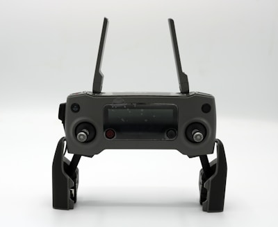 Drone operator monitoring autonomous flight progress from a modern control station.