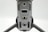 A close-up view of a drone's underside, showcasing various sensors, cameras, and LEDs arranged symmetrically along its body. The gray, metallic finish gives a sleek, modern appearance.