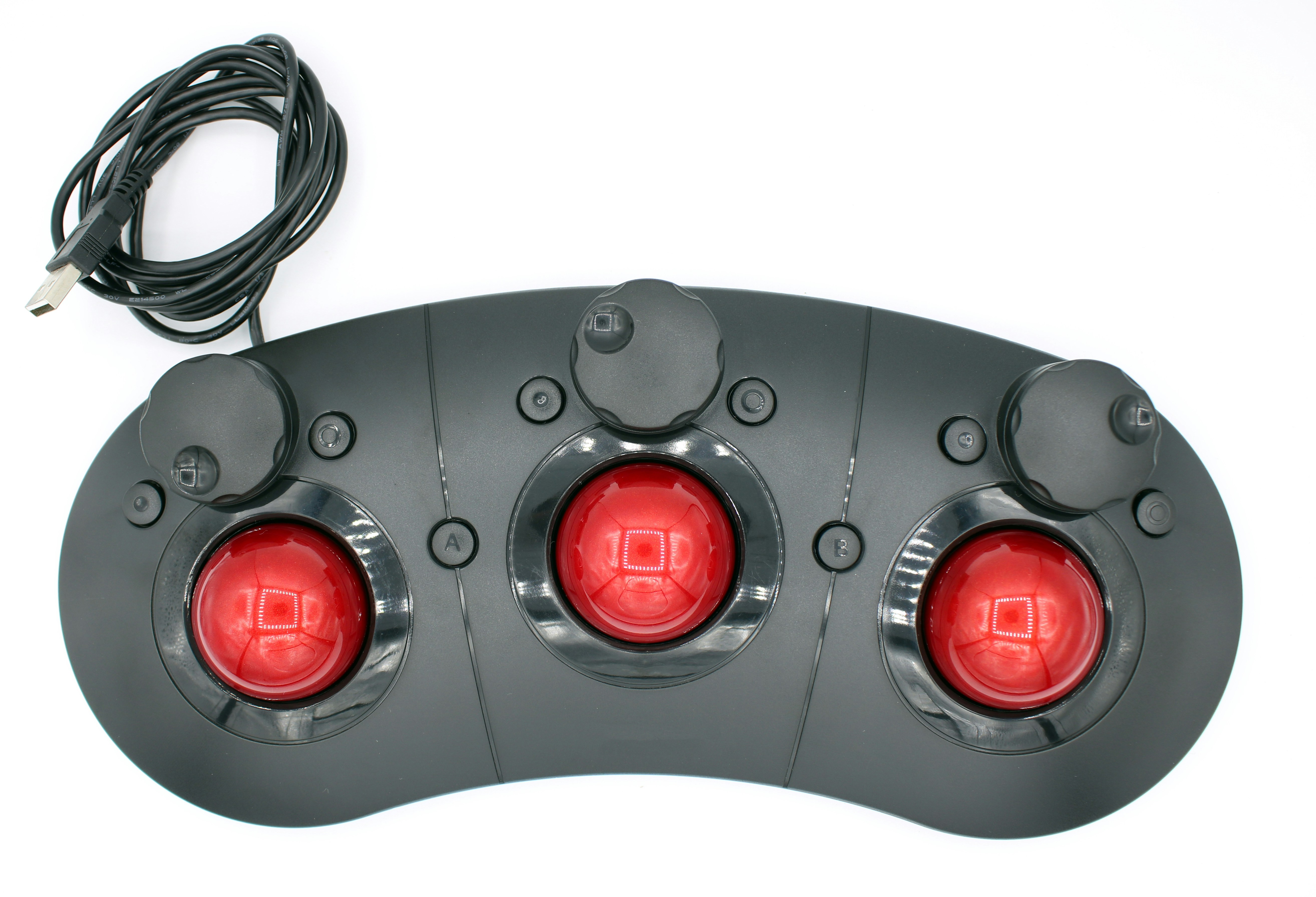 a close up of three red lights on a white surface