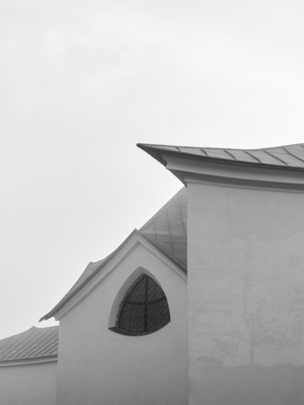 a black and white photo of a church