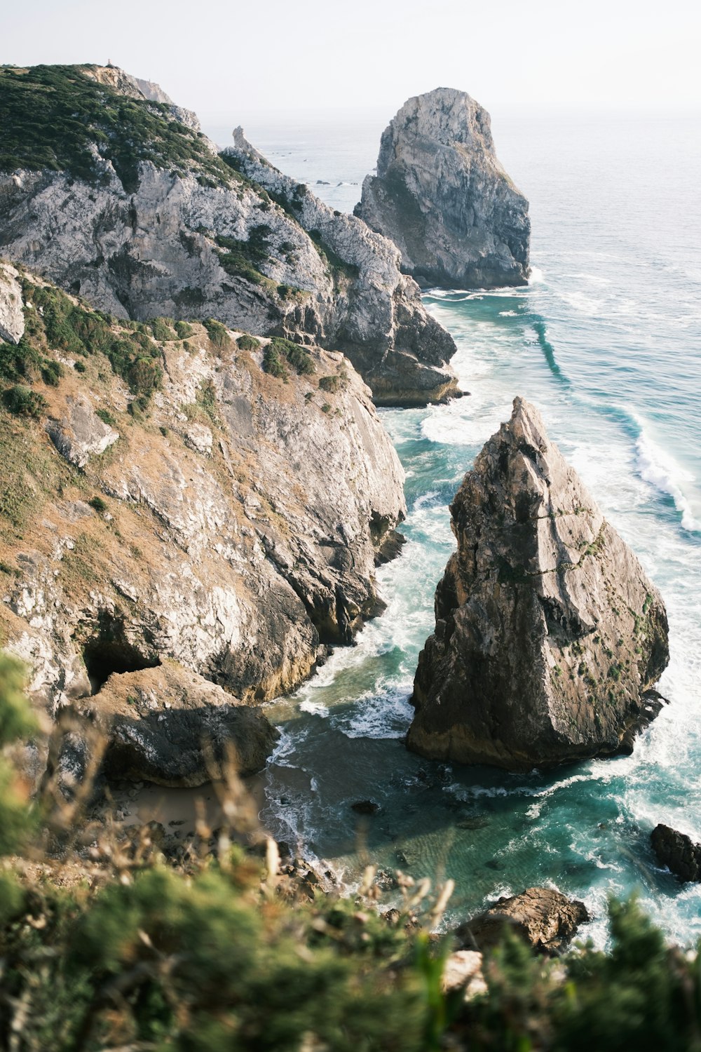 a view of a body of water near some rocks