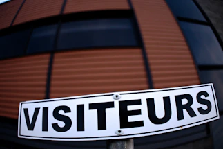 A welcoming entrance of the Remiremont stadium with clear signage and nearby parking