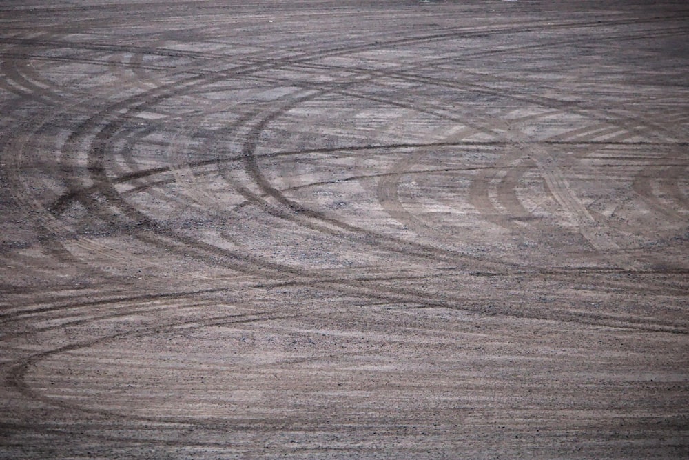 a person riding a motorcycle on a dirt track