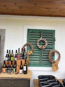 Rustic wine cork crafts displayed on a reclaimed wood table.