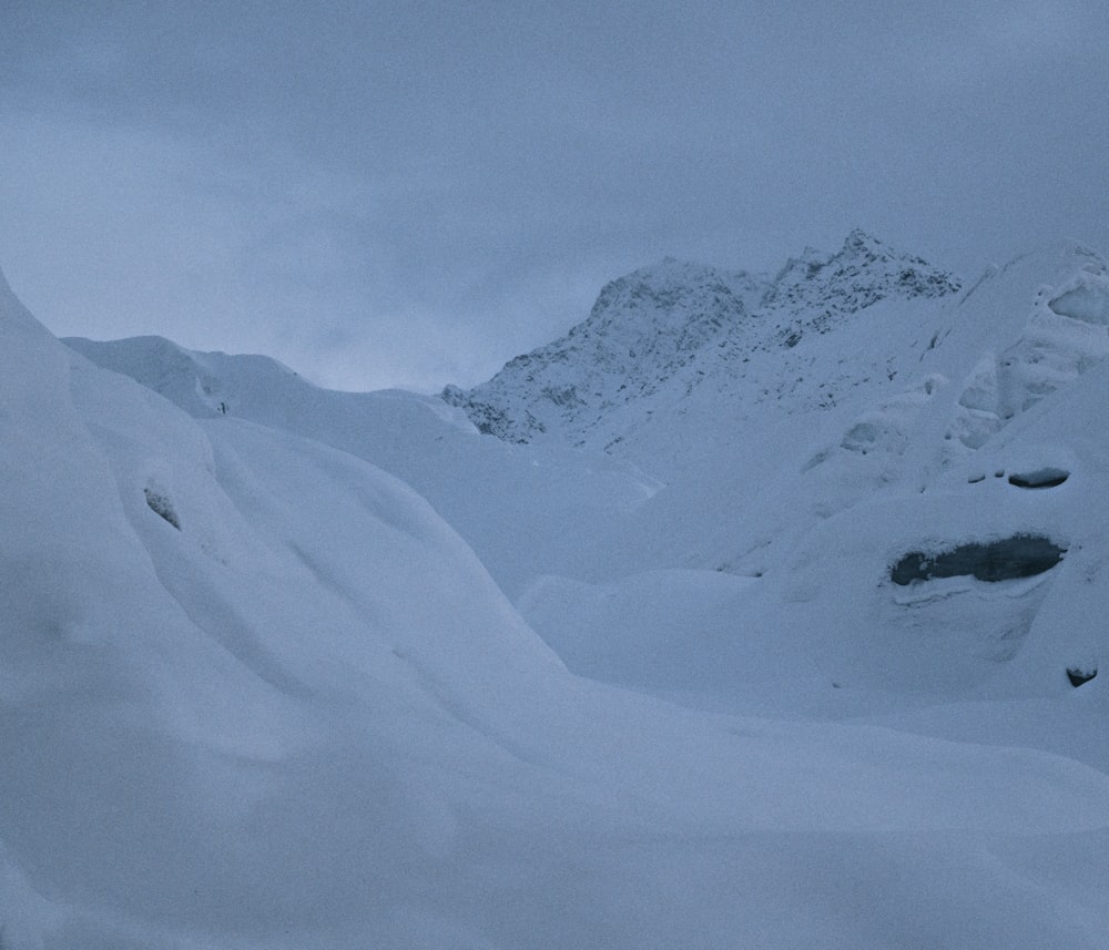 a person skiing down a snow covered mountain